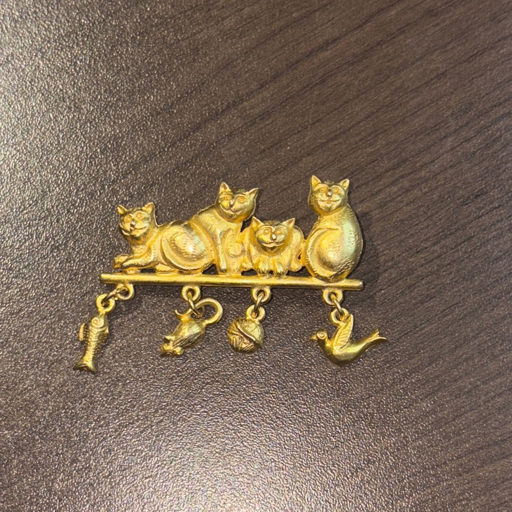 AJC sitting kitty Gold toned Cat Brooch with Charms